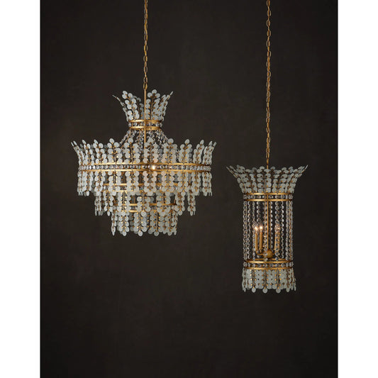 Bradshaw Chandelier by Currey and Company in frosted, clear, brass. Made from glass, crystal, wrought iron in a unique style.
