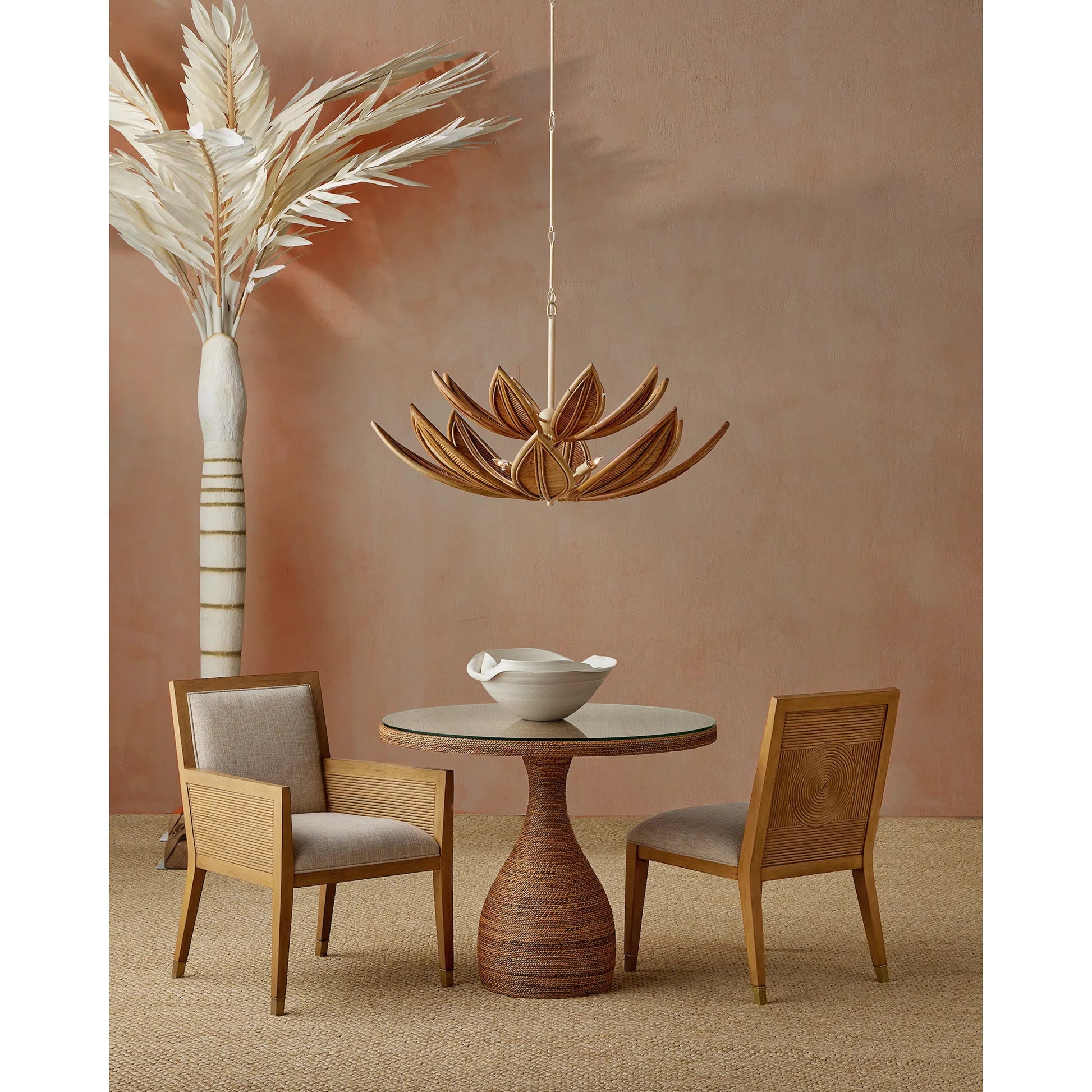 Santos Side Chair by Currey and Company. Made from mahogany, rattan, brass in a modern style.