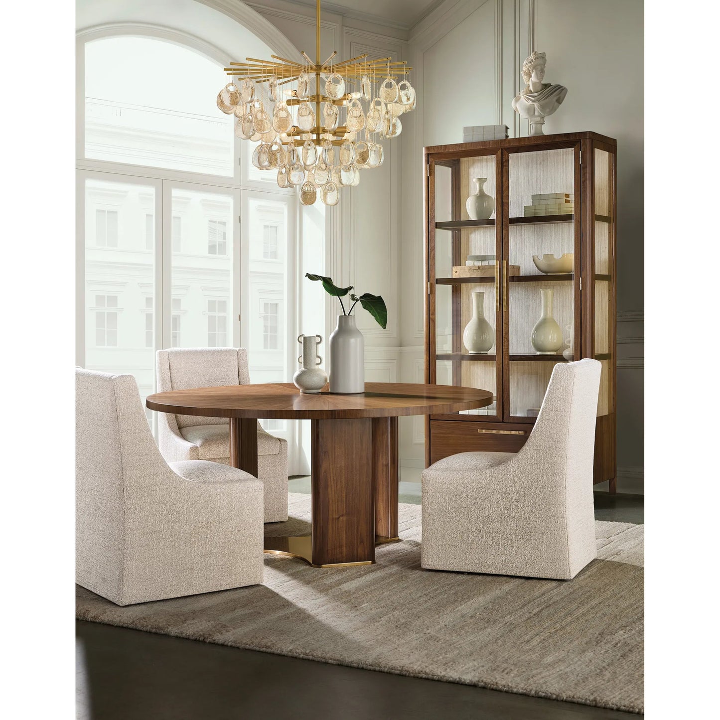 007 SI-2458561 | Lifestyle | Eleana Round Dining Table by Hooker Furniture in light caramel, sunlit bronze metal. Made from walnut veneers, metal in a modern style.