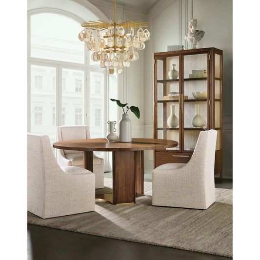 Eleana Round Dining Table by Hooker Furniture in light caramel, sunlit bronze metal. Made from walnut veneers, metal in a modern style.