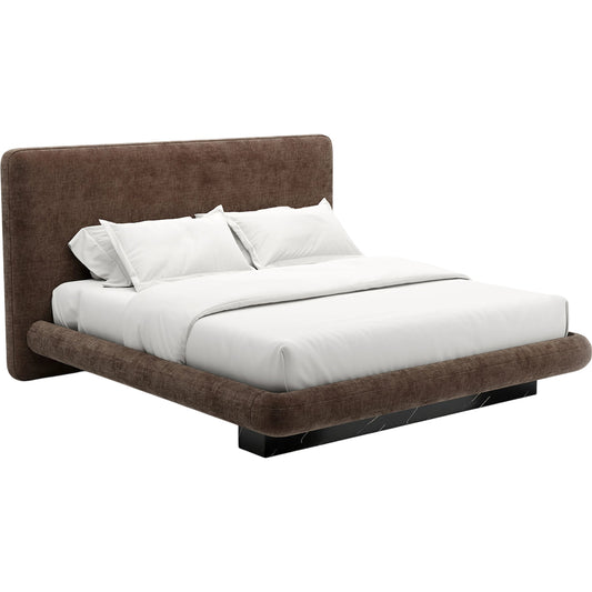 Overlap Upholstered Bed by Caracole. Made from stone in a transitional style.