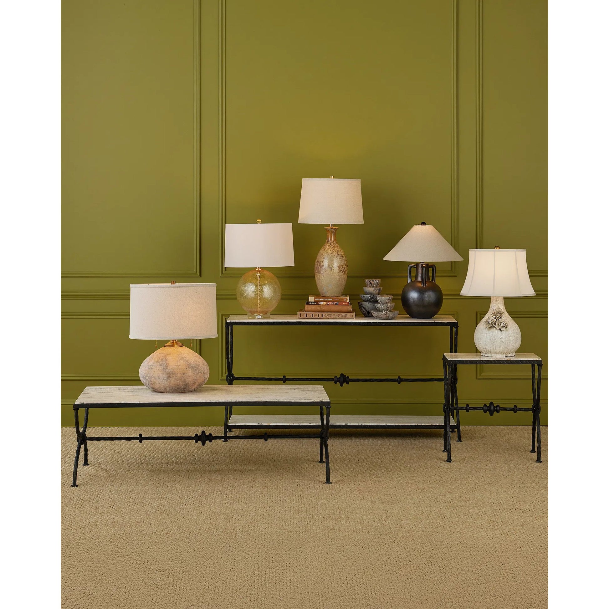 Agora White Travertine Console Table by Currey and Company in natural, rustic bronze. Made from white travertine, wrought iron in a modern style.