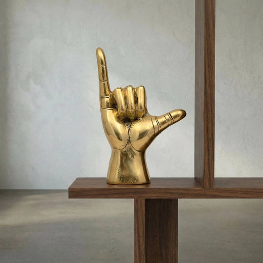 Hawaiian by Noir in brass. Made from brass in a modern style.