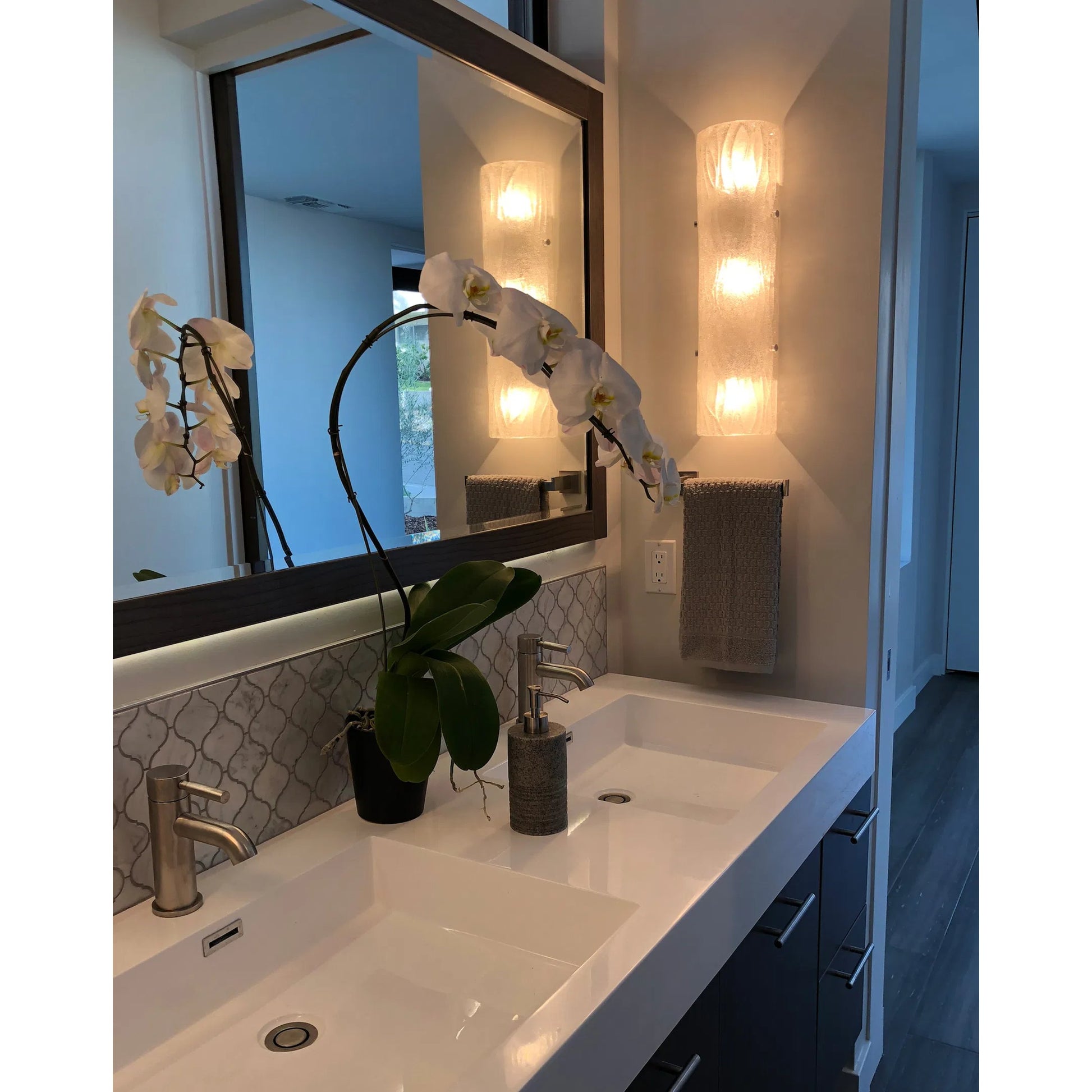 Brilliance Sconce Fixture by Varaluz in chrome. Made from chrome, bright ice in a modern style.