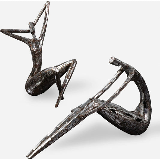 Dahy Statues by Uttermost in silver. Made from polyresin in a modern style.