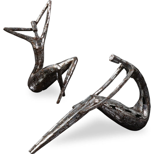 Dahy Statues (Set of 2) by Uttermost in silver. Made from polyresin in a modern style.