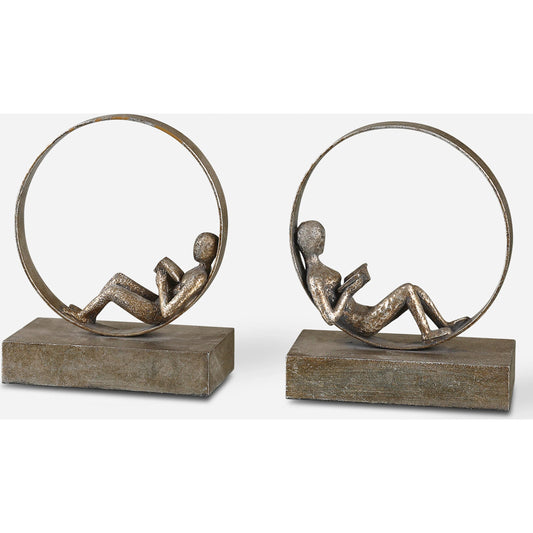 Lounging Reader Antique Bookends by Uttermost. Made from metal, mdf, resin in a modern style.