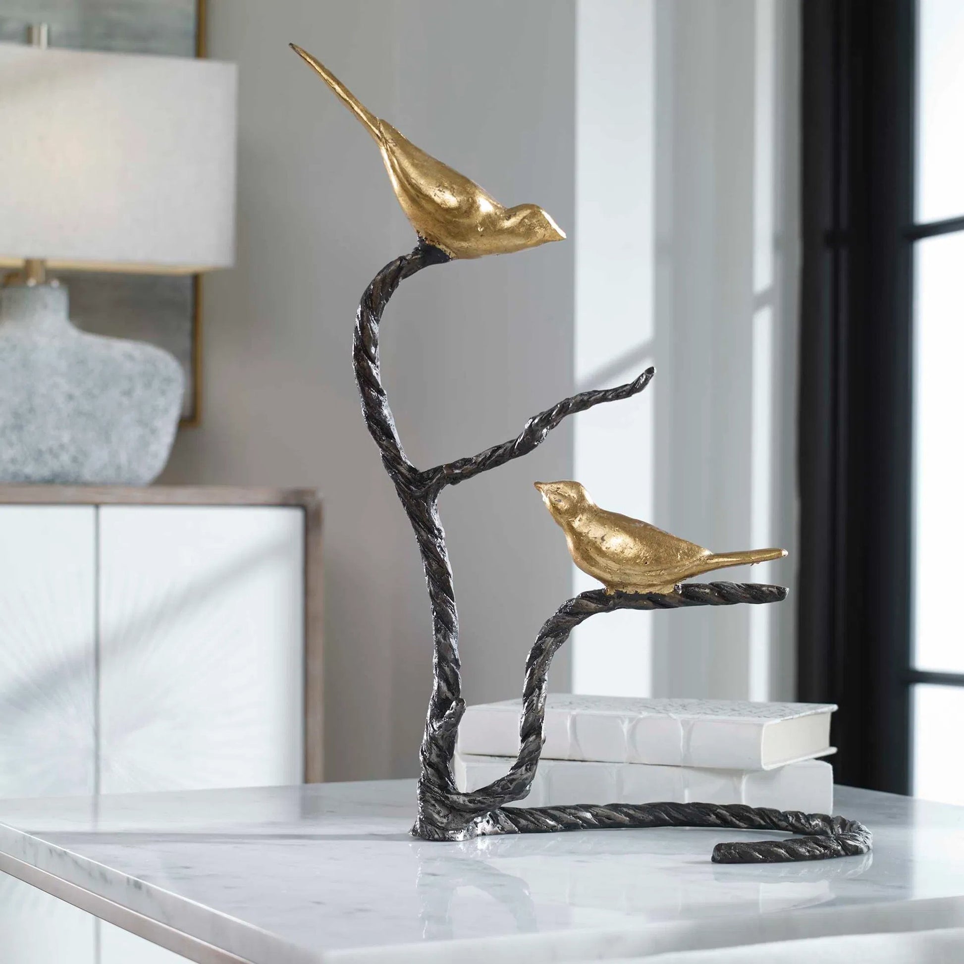 Birds on a Limb Sculpture by Uttermost. Made from metal in a cottage & farmhouse style.