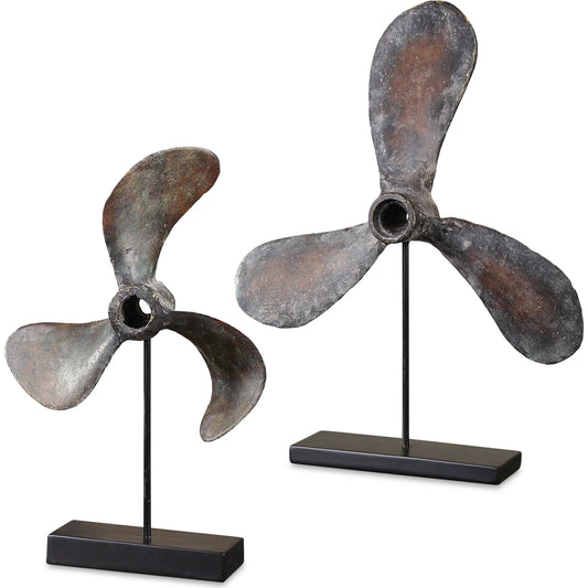 Propellers Rust Sculptures (Set of 2) by Uttermost in rust. Made from resin, metal in a cottage & farmhouse style.
