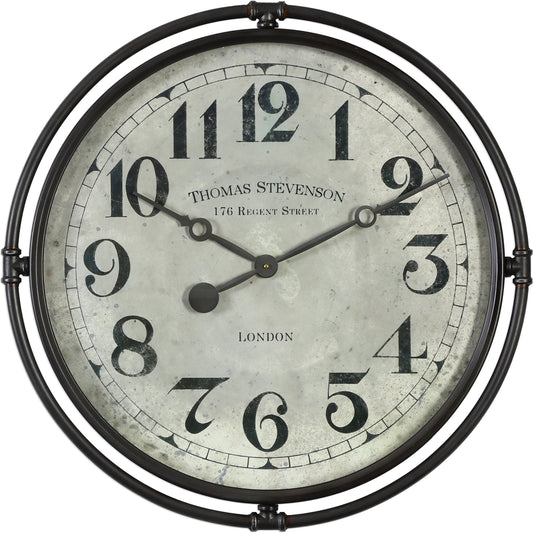 Nakul Industrial Wall Clock by Uttermost. Made from iron, mdf, glass, movement in a traditional style.