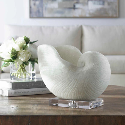 Nautilus Shell Sculpture by Uttermost. Made from polyester, crystal in a coastal style.