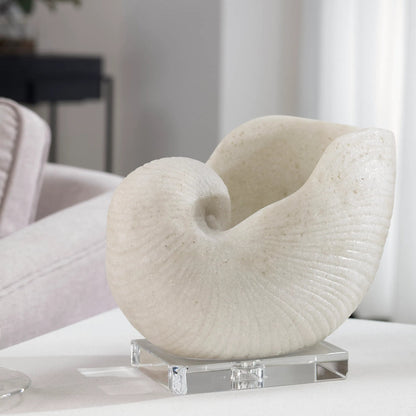 Nautilus Shell Sculpture by Uttermost. Made from polyester, crystal in a coastal style.