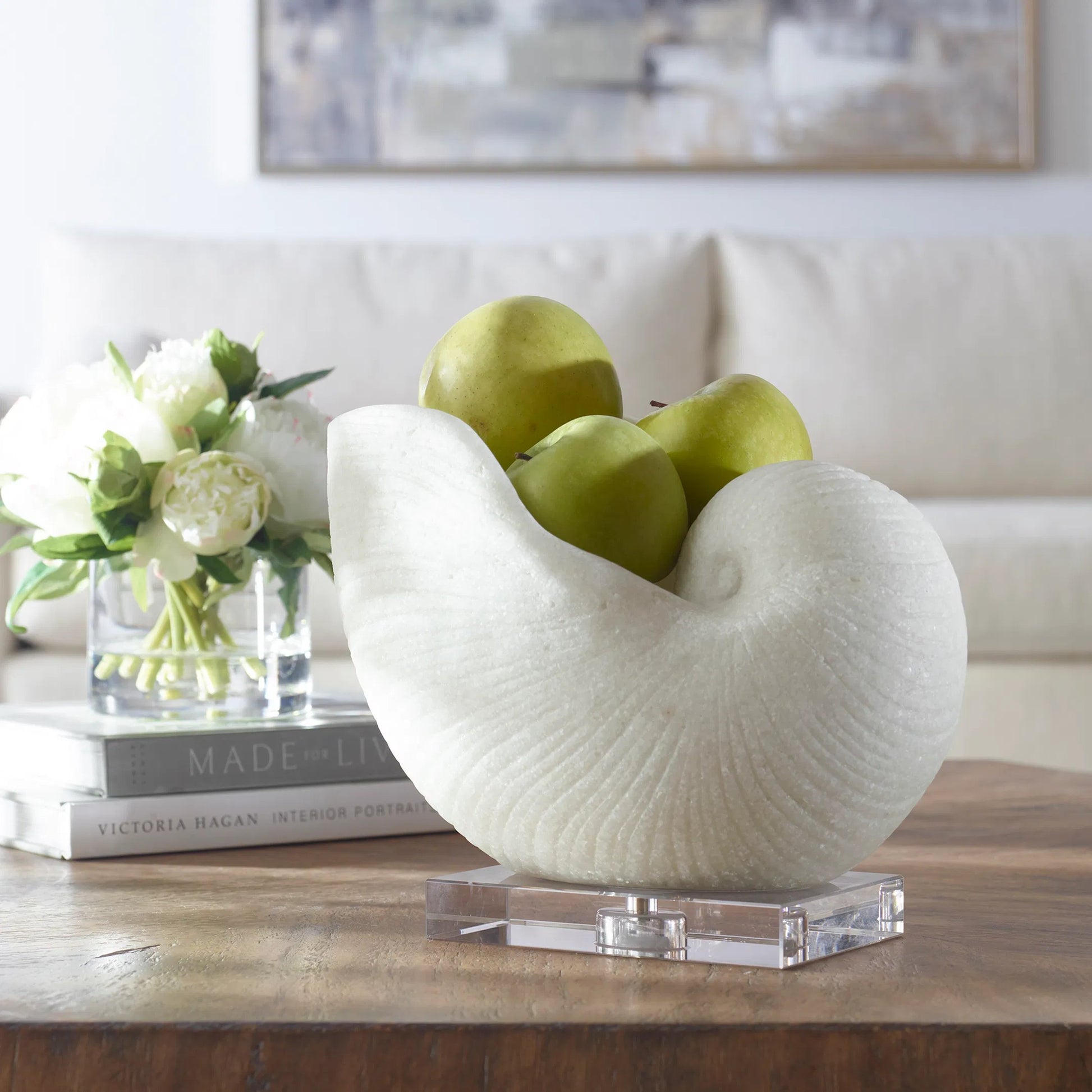 Nautilus Shell Sculpture by Uttermost. Made from polyester, crystal in a coastal style.