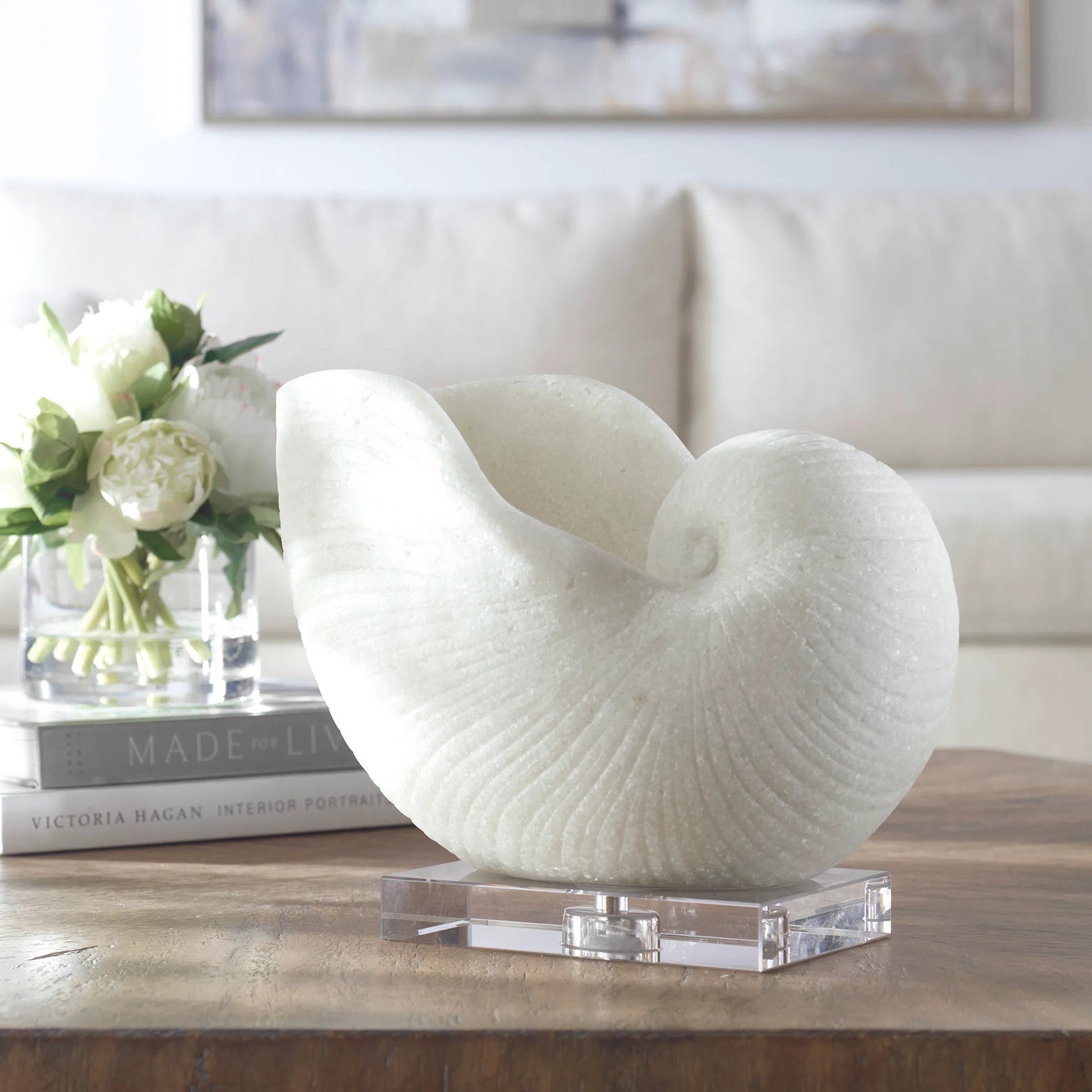 Nautilus Shell Sculpture by Uttermost. Made from polyester, crystal in a coastal style.