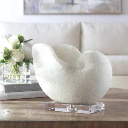 Nautilus Shell Sculpture by Uttermost. Made from polyester, crystal in a coastal style.