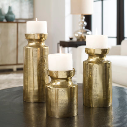 Amina Antique Brass Candleholders by Uttermost. Made from aluminum, wax in a eclectic & global style.