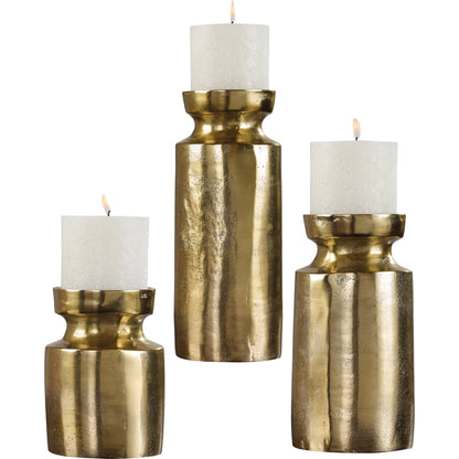 Amina Antique Brass Candleholders by Uttermost. Made from aluminum, wax in a eclectic & global style.
