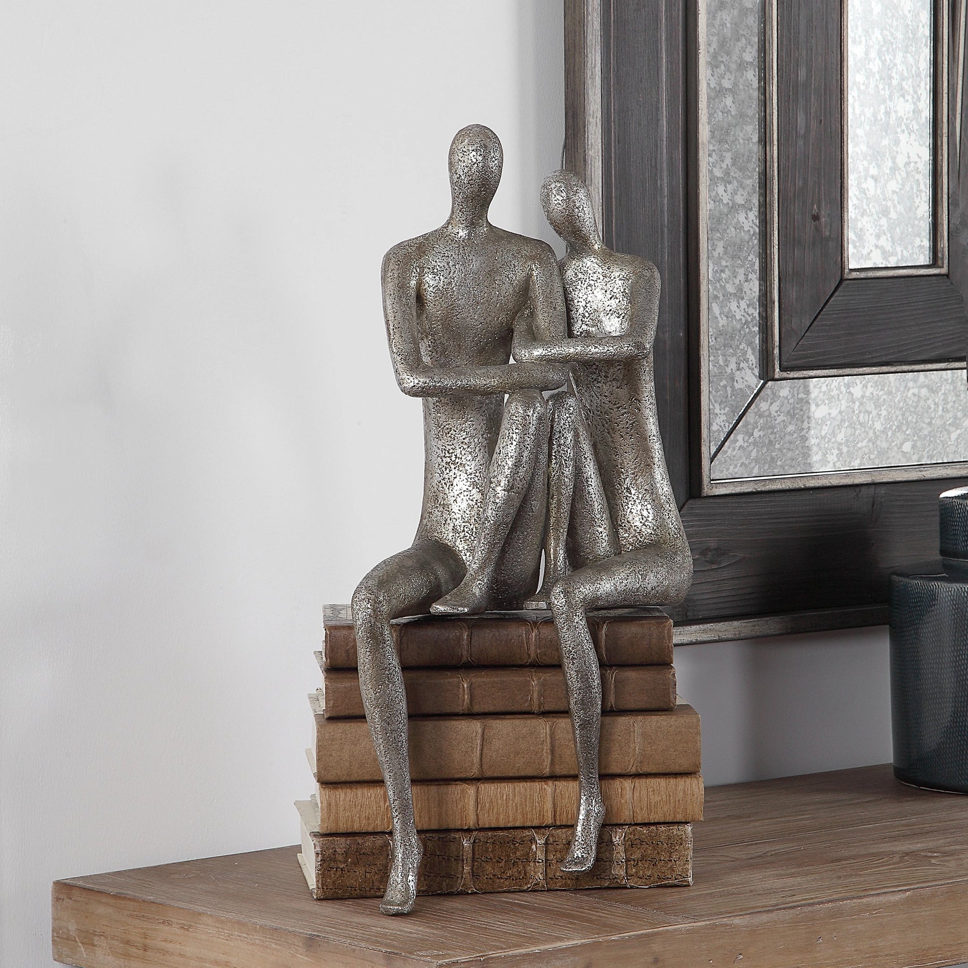 Courtship Figurine by Uttermost in nickel. Made from resin in a modern style.