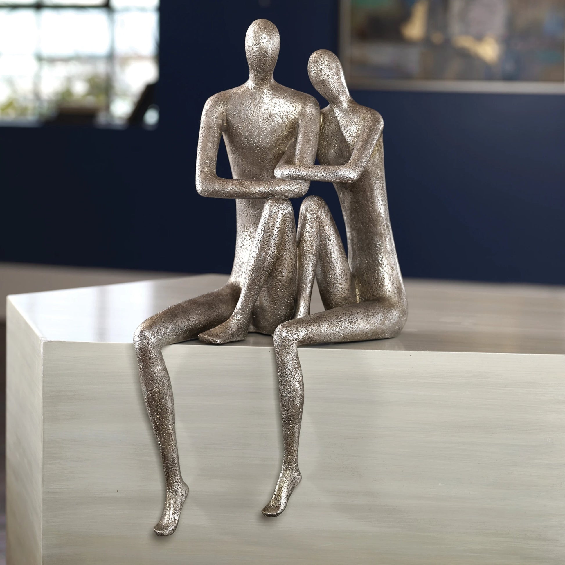 Courtship Figurine by Uttermost in nickel. Made from resin in a modern style.