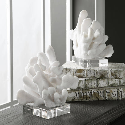 Charbel Bookends by Uttermost in white. Made from resin, k9cystal in a coastal style.
