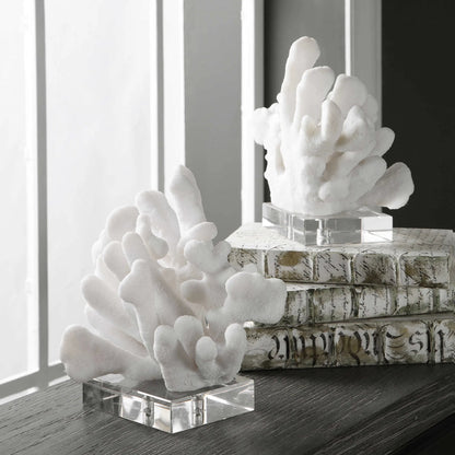 Charbel Bookends by Uttermost in white. Made from resin, k9cystal in a coastal style.