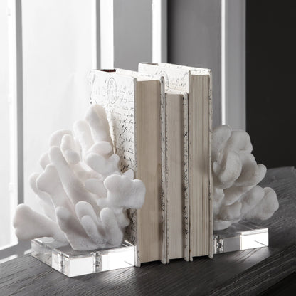 Charbel Bookends by Uttermost in white. Made from resin, k9cystal in a coastal style.