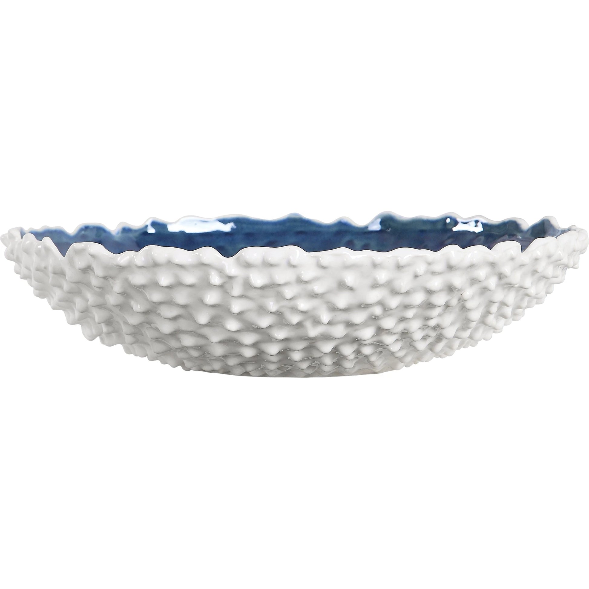 Ciji Bowl by Uttermost in white. Made from ceramic in a coastal style.