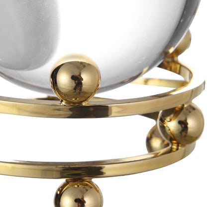 Alega Spheres by Uttermost in polished gold. Made from crystal, steel in a transitional style.