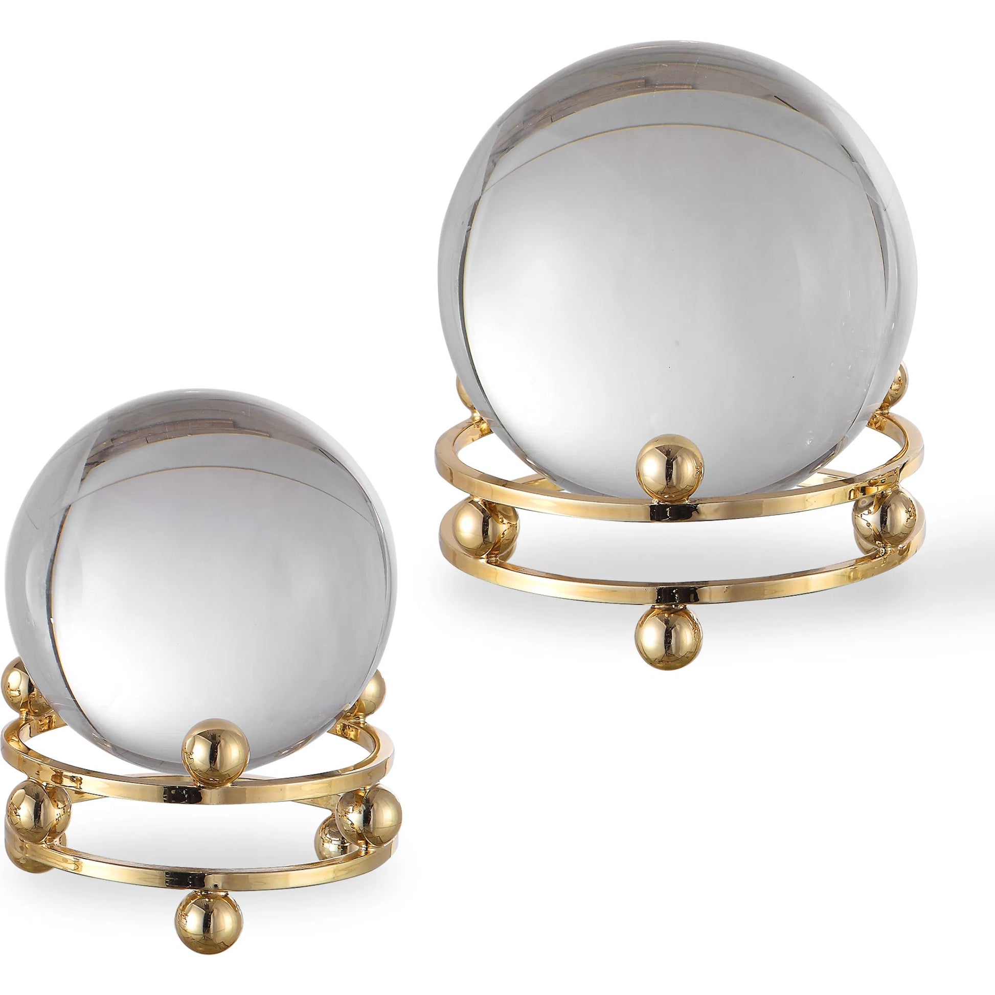 Alega Spheres by Uttermost in polished gold. Made from crystal, steel in a transitional style.