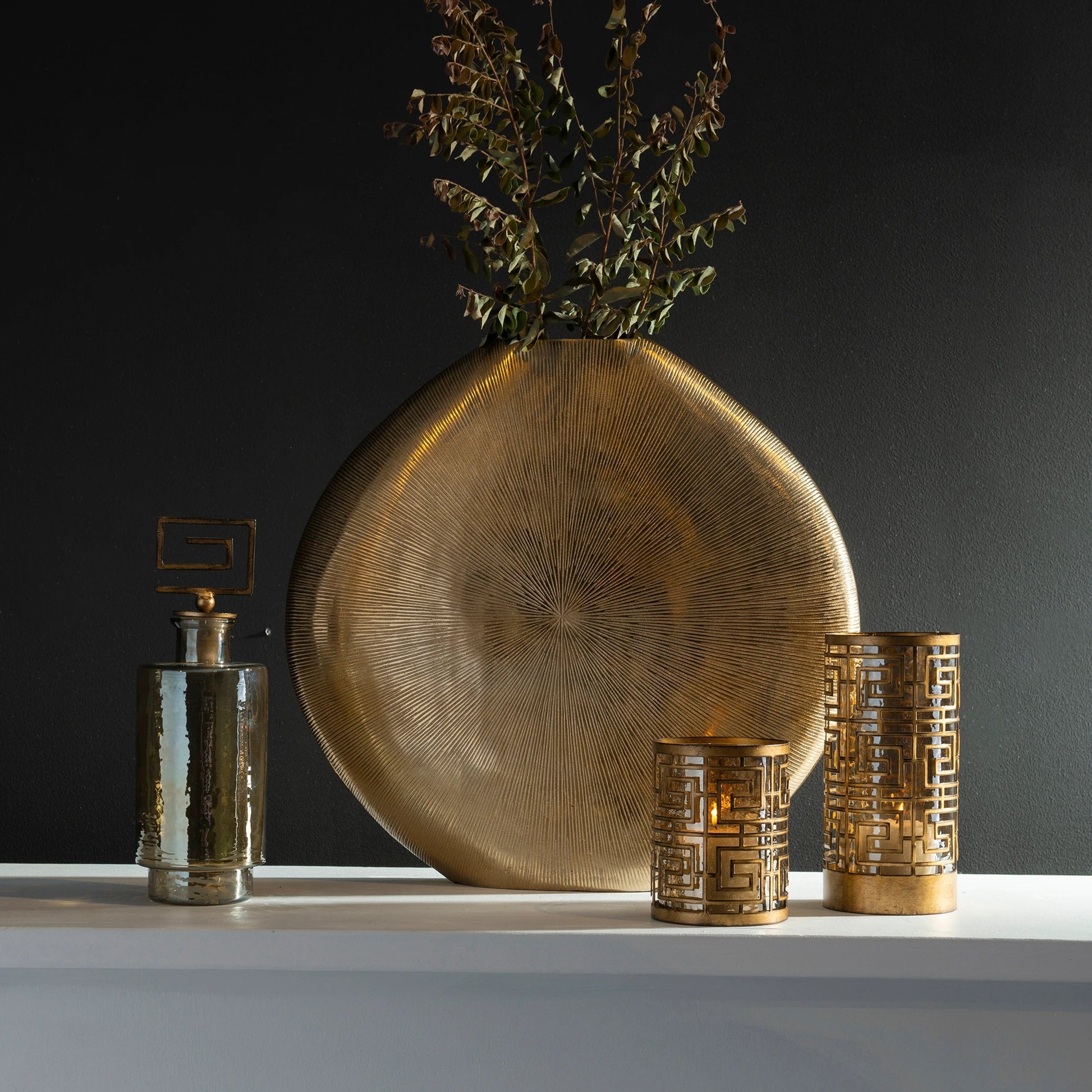 Gretchen Vase by Uttermost in gold. Made from aluminum in a eclectic & global style.