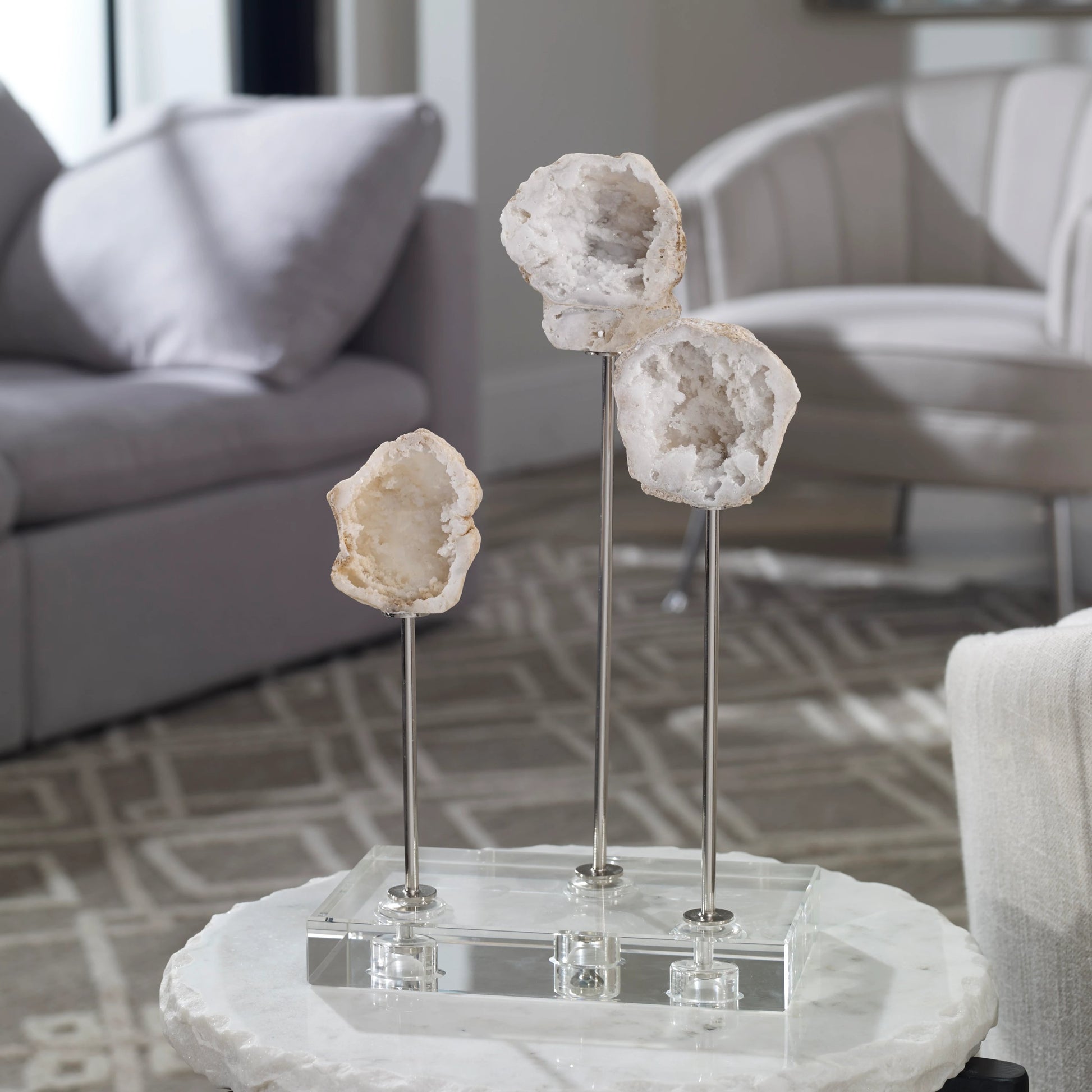 Cyrene Natural Stone Accessory by Uttermost. Made from steel, marble, crystal in a coastal style.