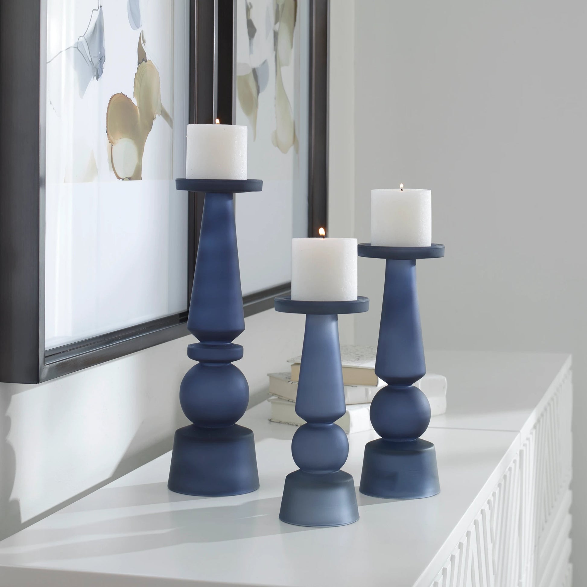 Cassiopeia Candleholders by Uttermost. Made from glass in a modern style.