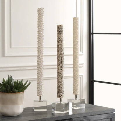 Makira Cylindrical Sculptures by Uttermost. Made from ceramic, crystal, iron in a eclectic & global style.