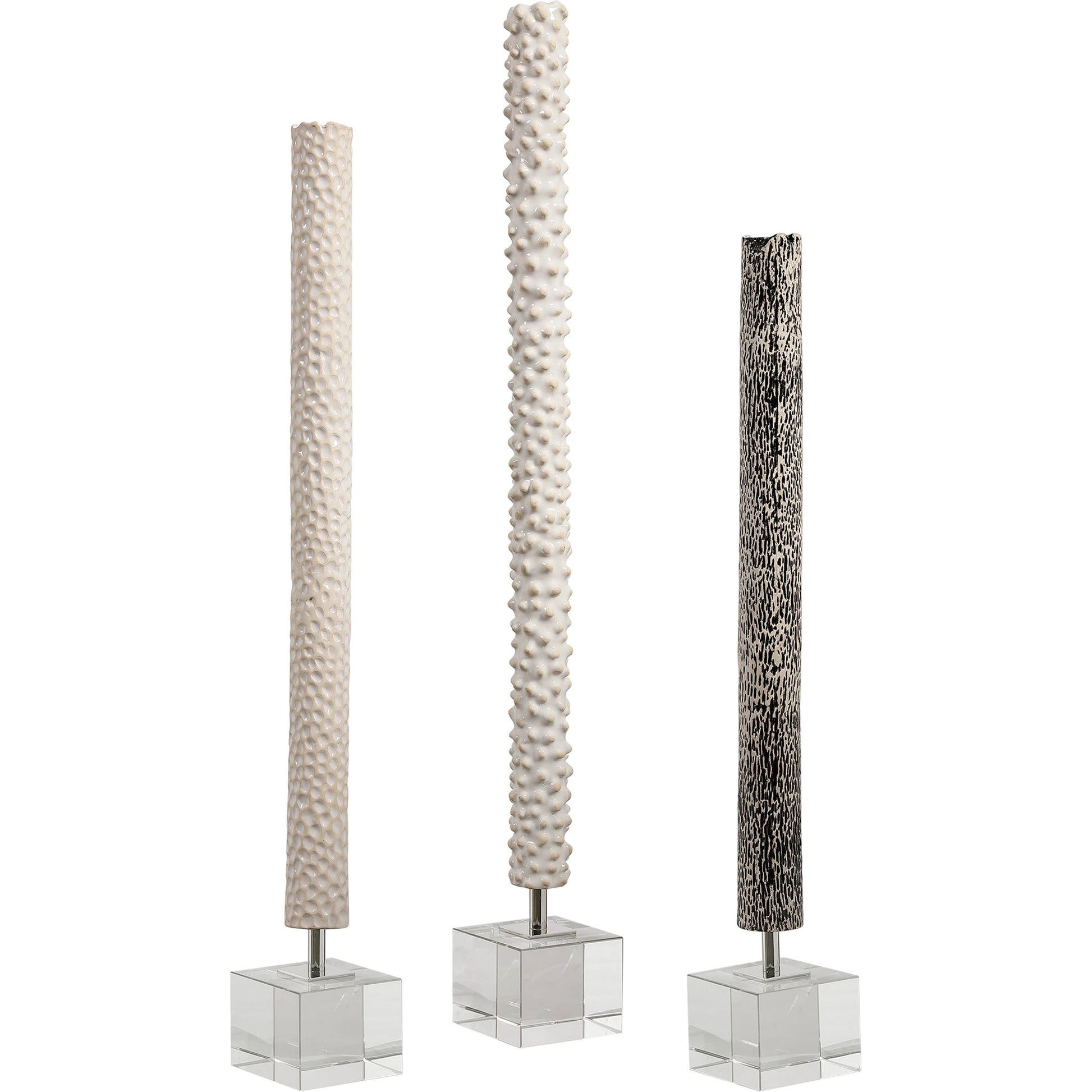 Makira Cylindrical Sculptures by Uttermost. Made from ceramic, crystal, iron in a eclectic & global style.
