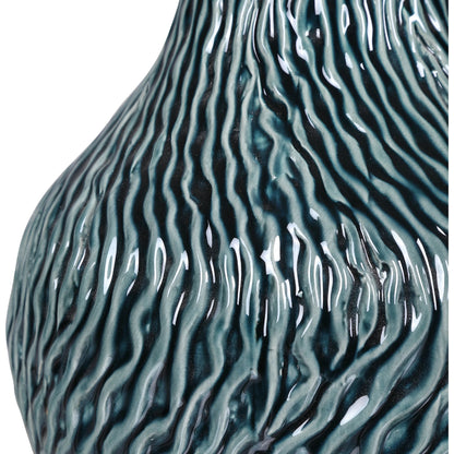 Almera Dark Bottles by Uttermost in teal. Made from ceramic, crystal, iron in a coastal style.