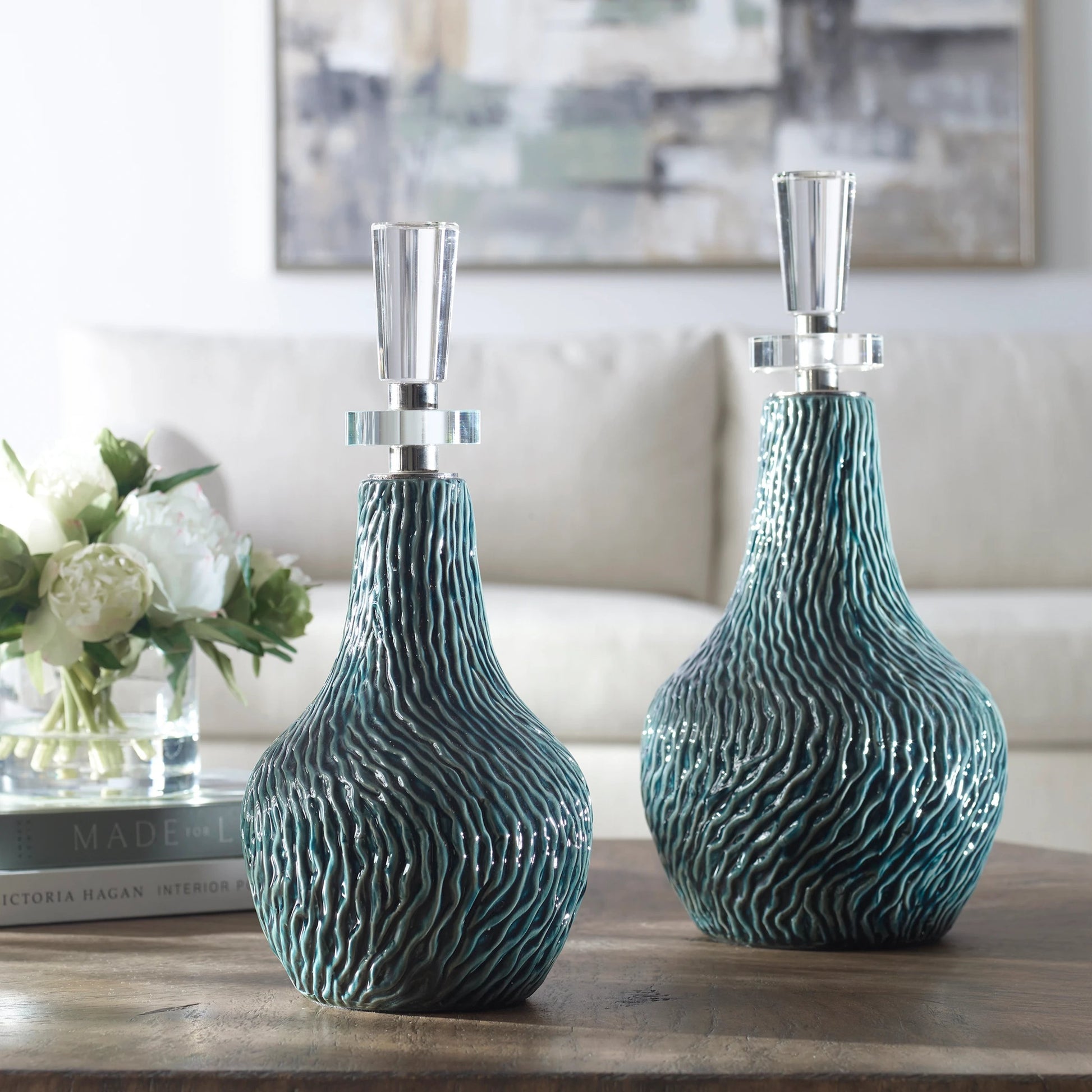Almera Dark Bottles by Uttermost in teal. Made from ceramic, crystal, iron in a coastal style.