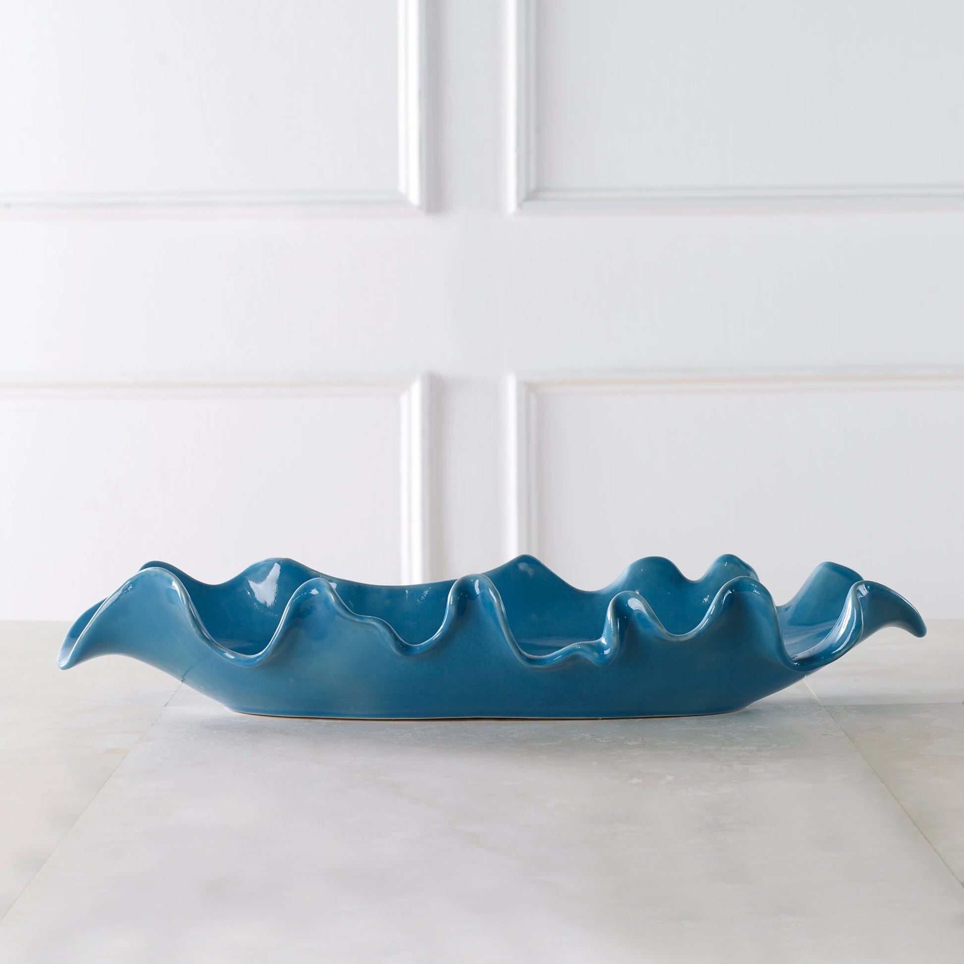 Ruffled Feathers Bowl by Uttermost. Made from earthenware in a modern style.
