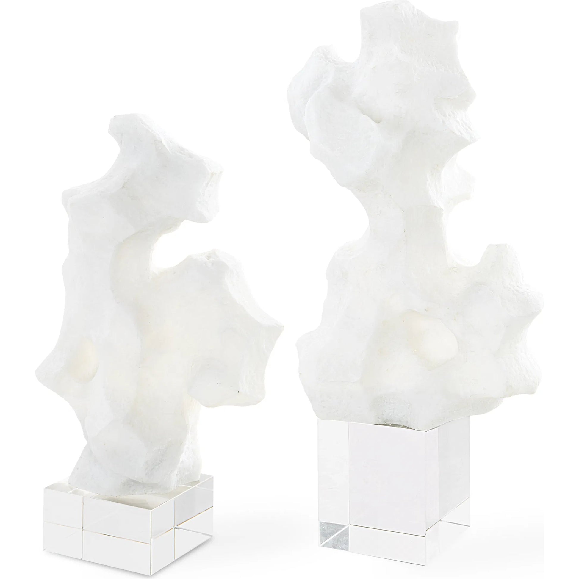 Remnant Sculptures by Uttermost in white. Made from man-made stone, crystal in a modern style.