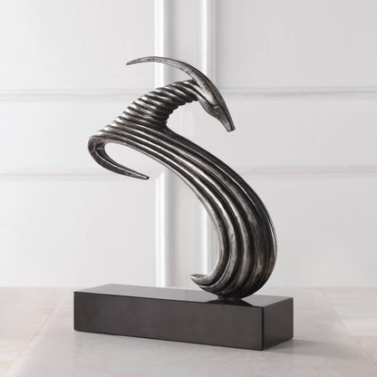 Take the Lead Sculpture by Uttermost in aged silver. Made from iron, marble in a modern style.