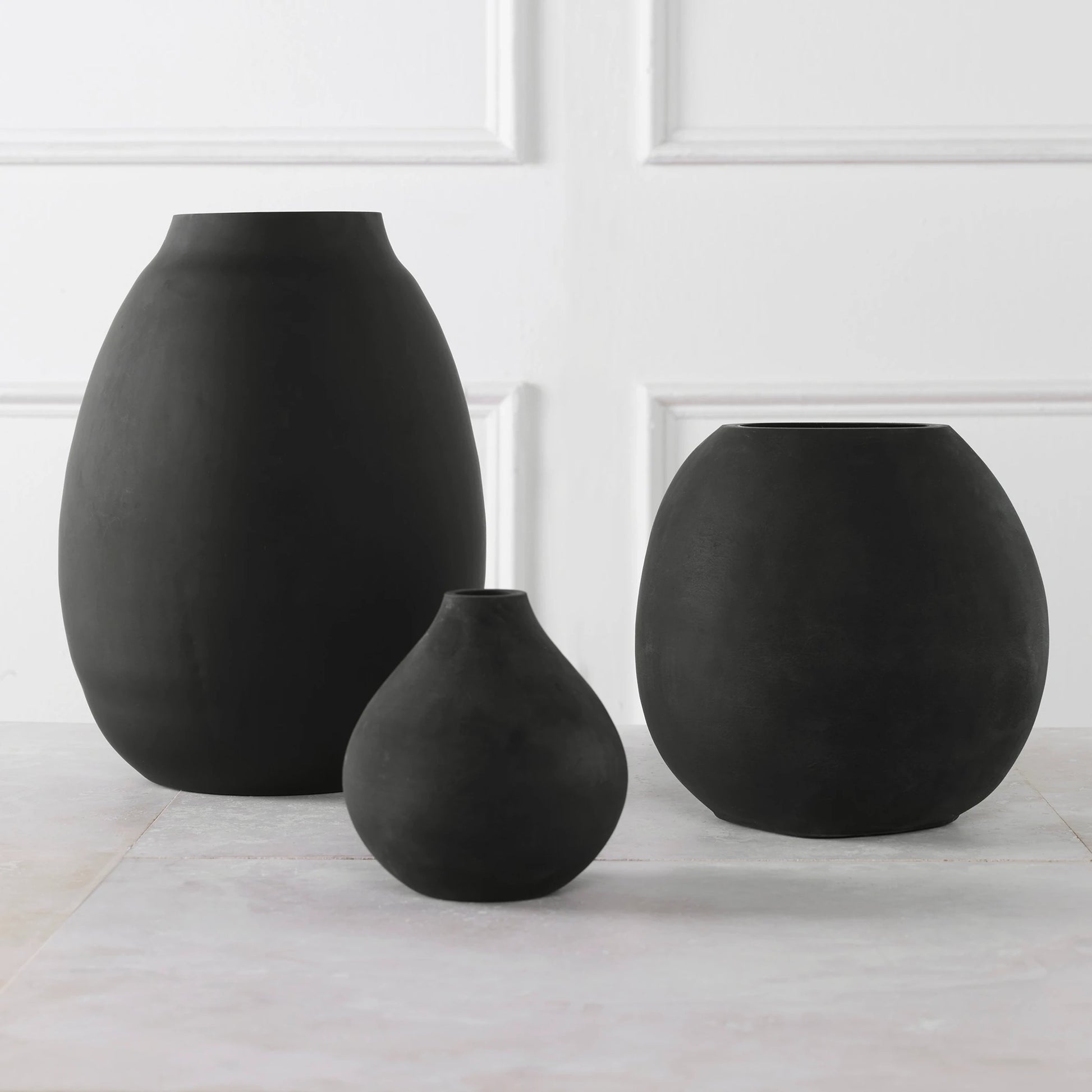 Hearth Vases by Uttermost in matte black. Made from glass in a modern style.