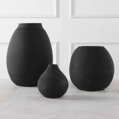 Hearth Vases by Uttermost in matte black. Made from glass in a modern style.