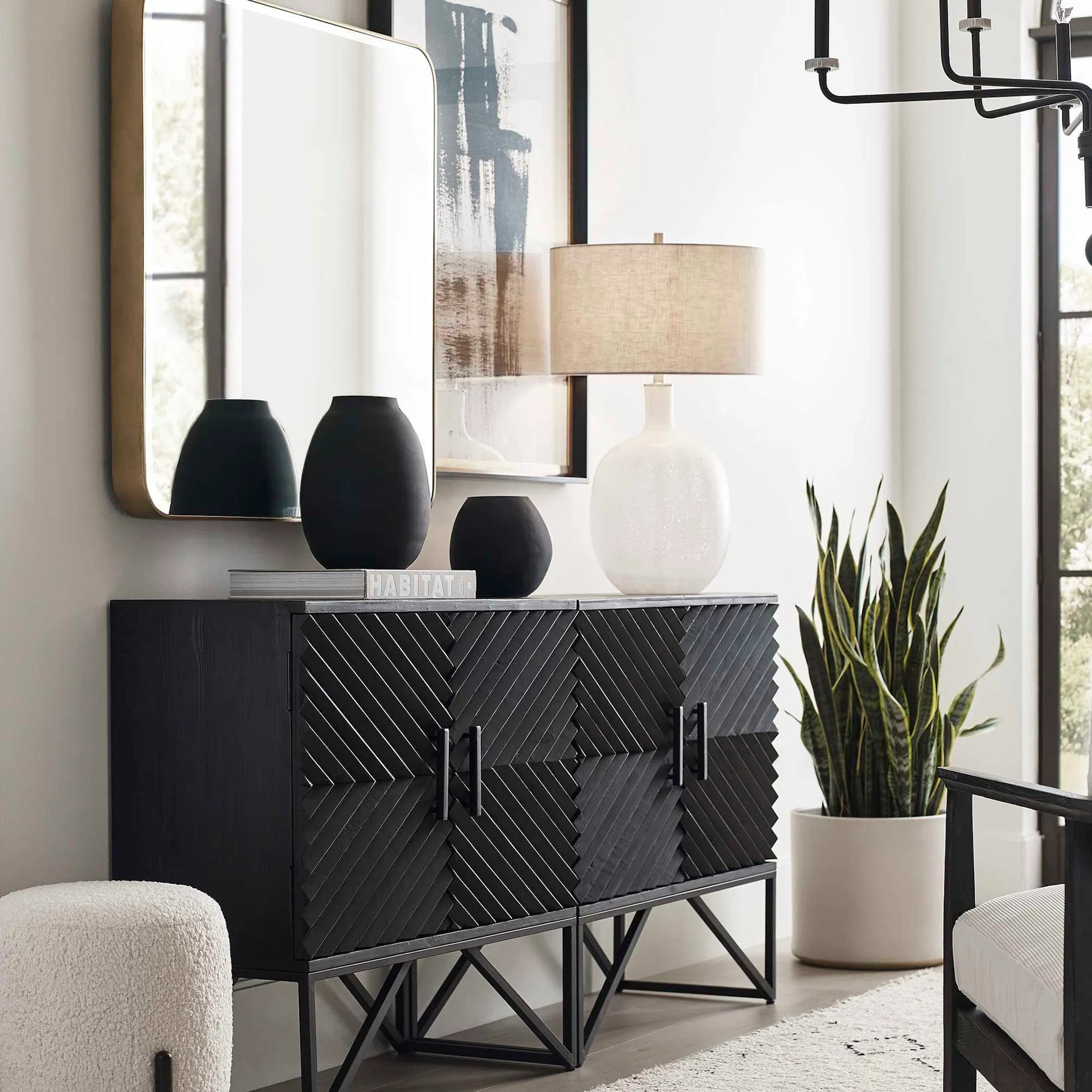 Hearth Vases by Uttermost in matte black. Made from glass in a modern style.