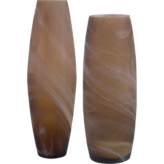 Delicate Swirl Vases by Uttermost in caramel. Made from glass in a modern style.