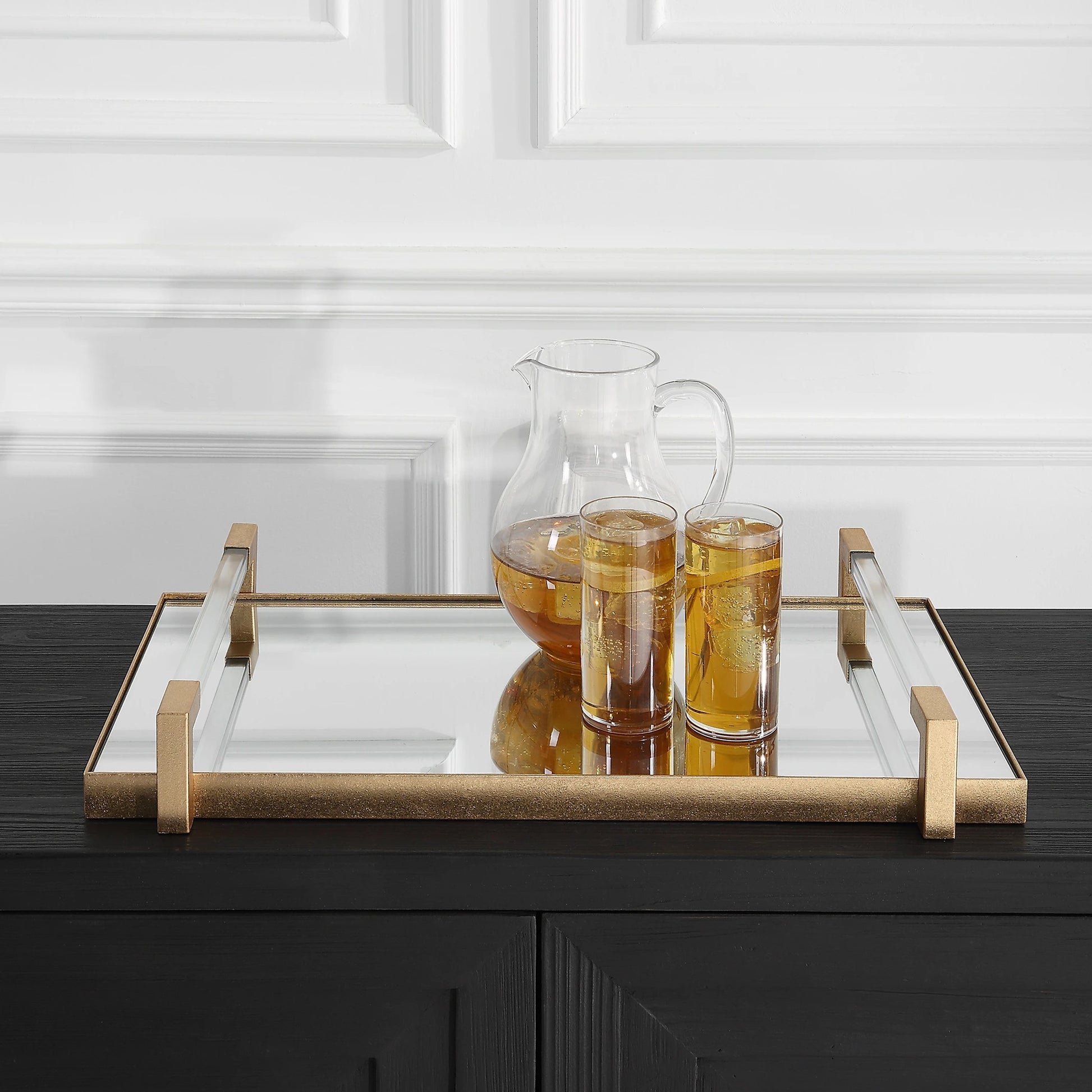 Deki Tray by Uttermost in gold. Made from iron, mirror, acrylic in a modern style.