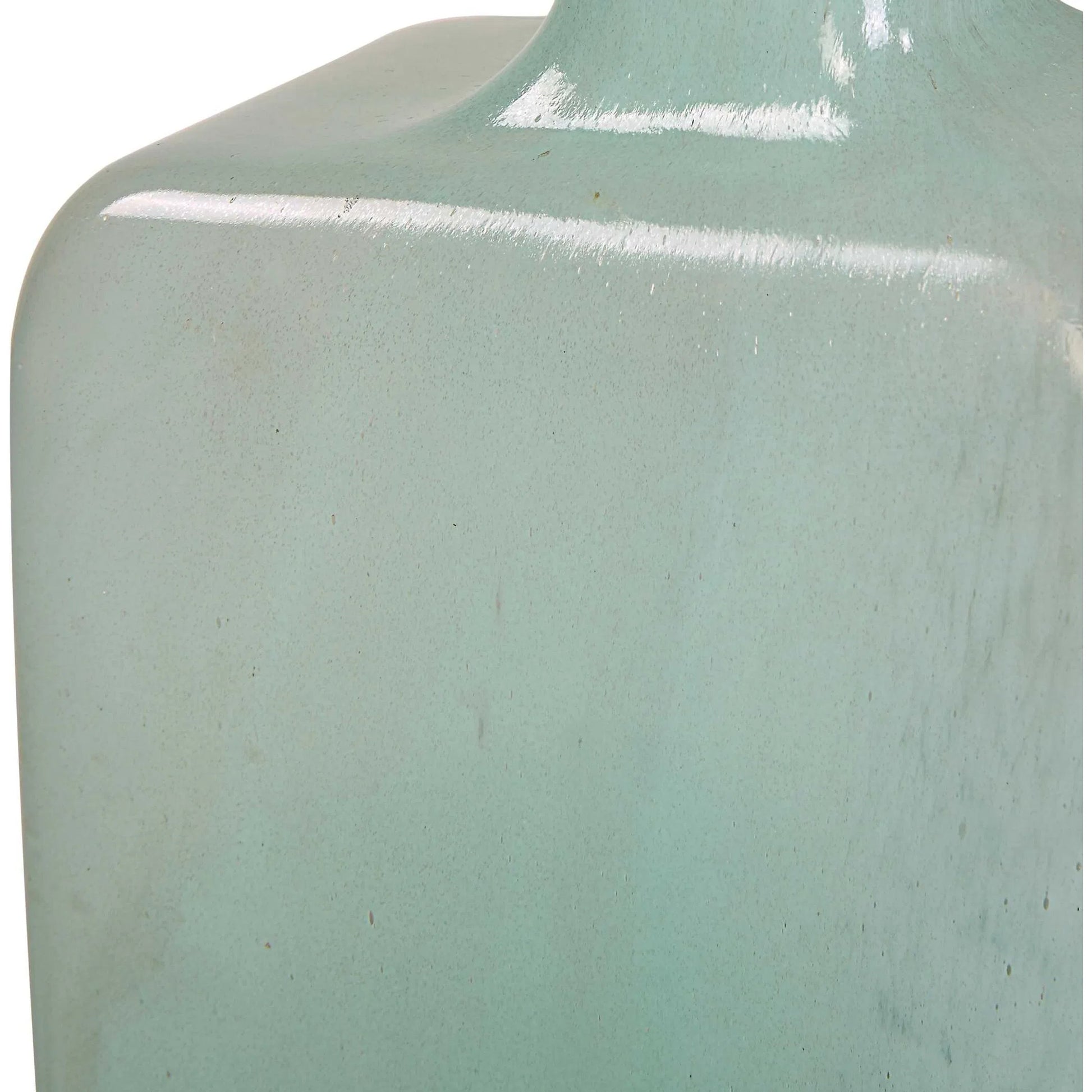 Fuze Vases by Uttermost in aqua, bronze. Made from glass in a modern style.