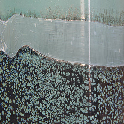 Fuze Vases by Uttermost in aqua, bronze. Made from glass in a modern style.