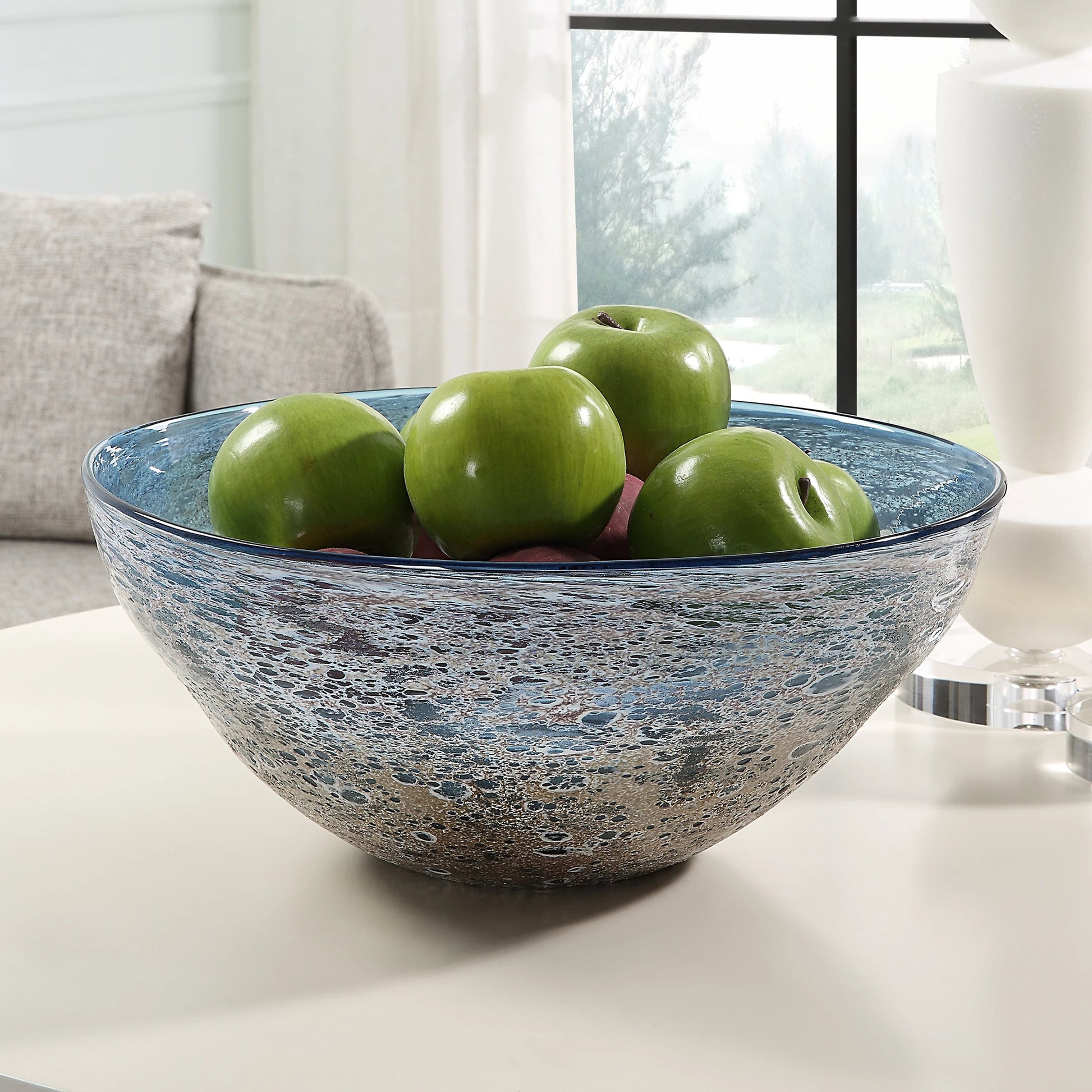 Genovesa Glass Bowl by Uttermost in aqua. Made from glass in a modern style.
