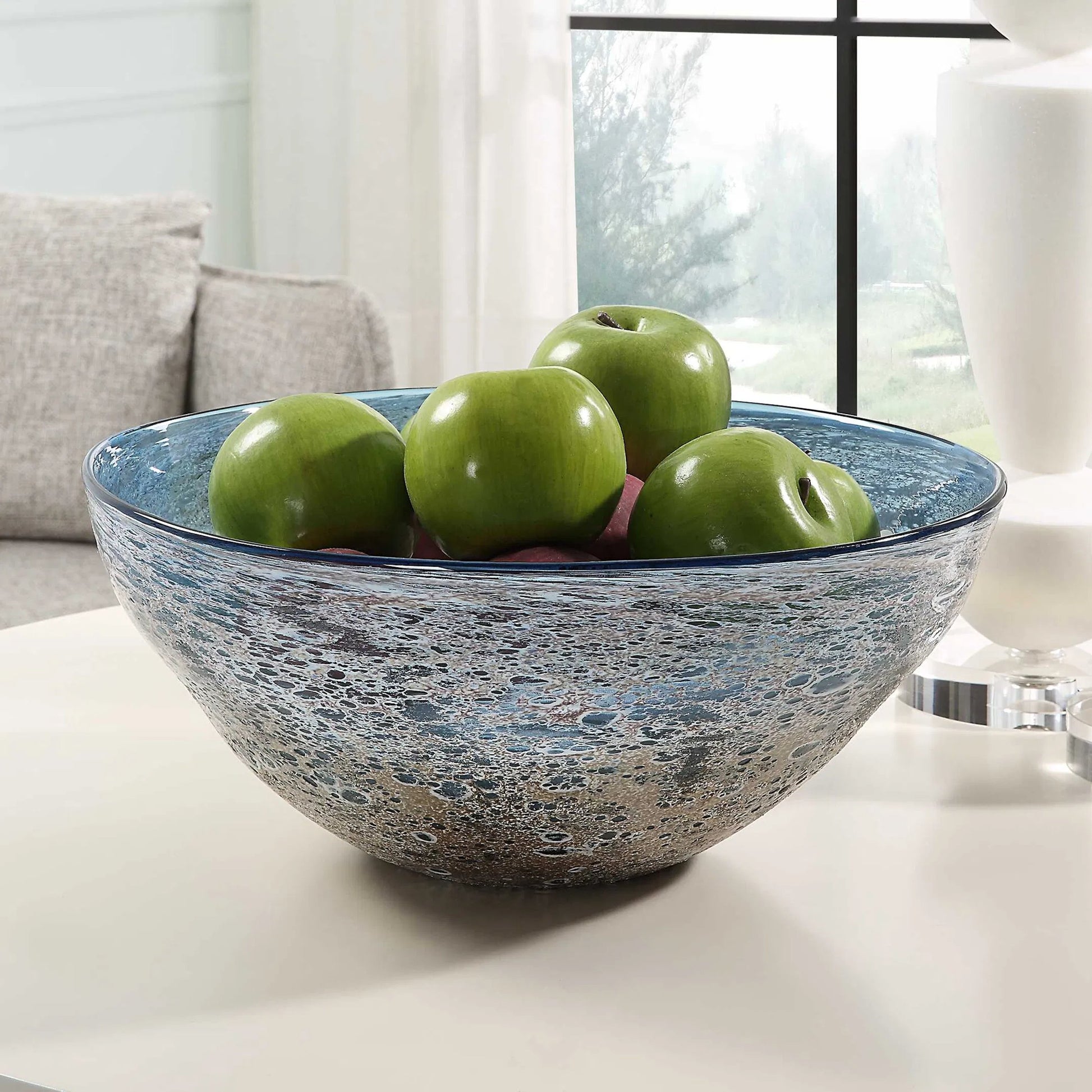 Genovesa Glass Bowl by Uttermost in aqua. Made from glass in a modern style.