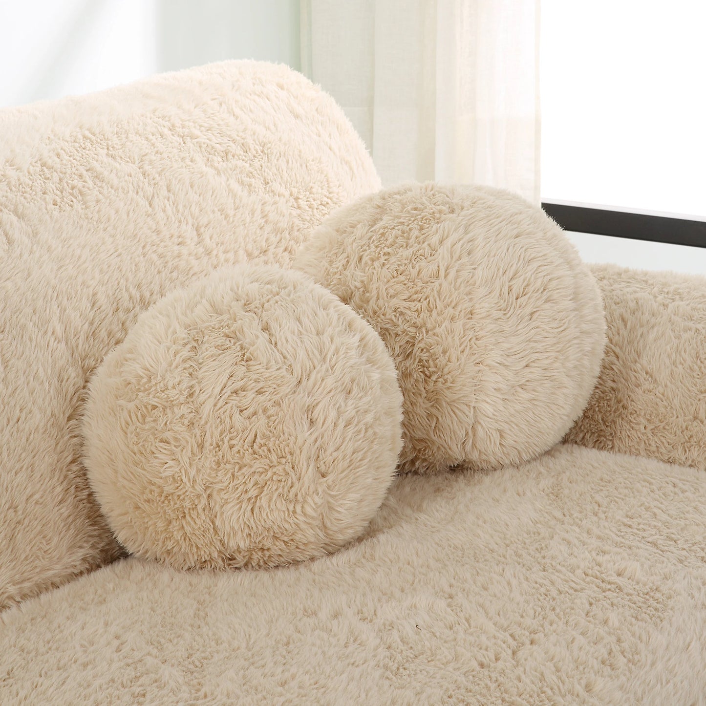 004 SI-2146913 | Lifestyle | Abide Ball Sheepskin Pillows by Uttermost in caramel. Made from fabric in a modern style.