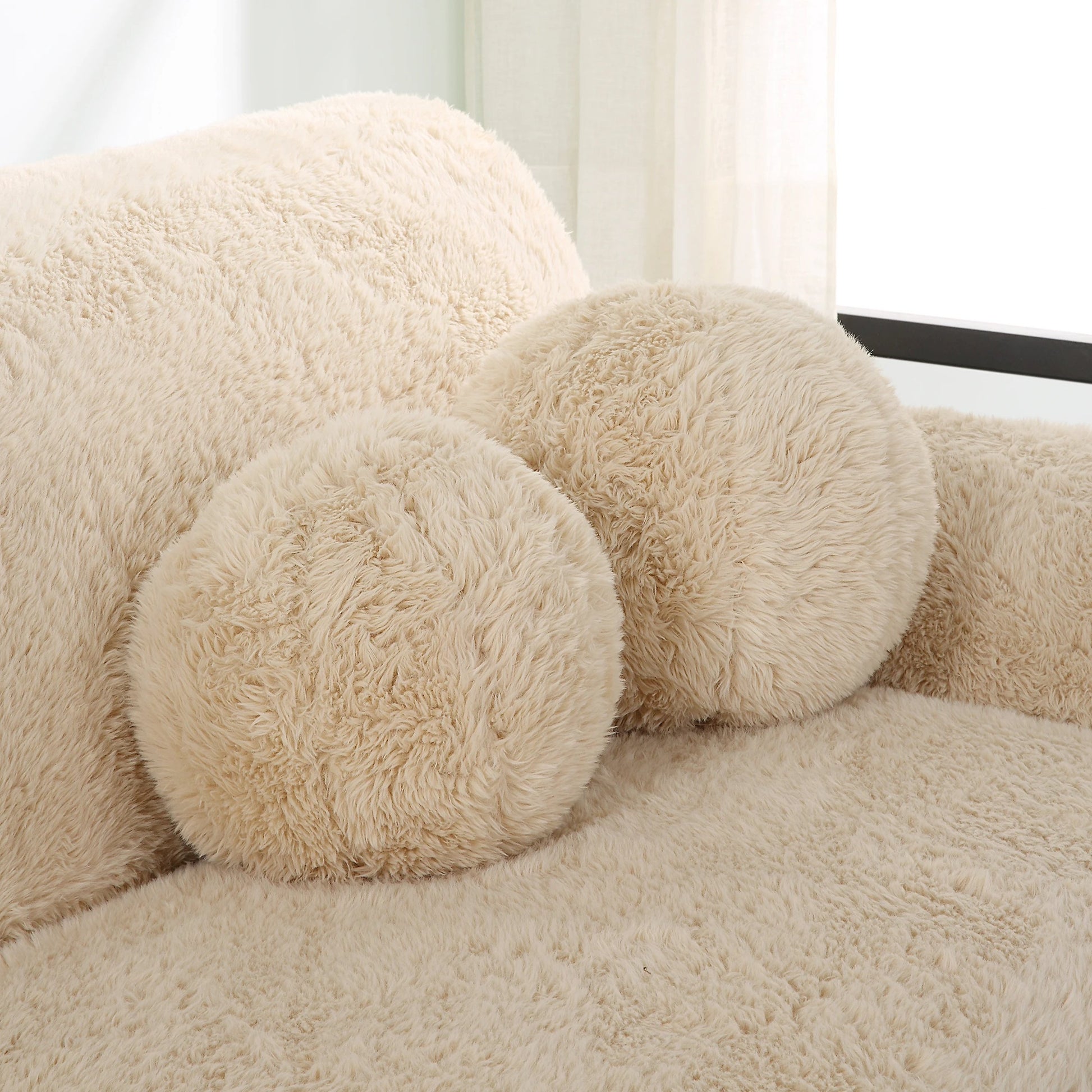 Abide Ball Sheepskin Pillows by Uttermost in caramel. Made from fabric in a modern style.